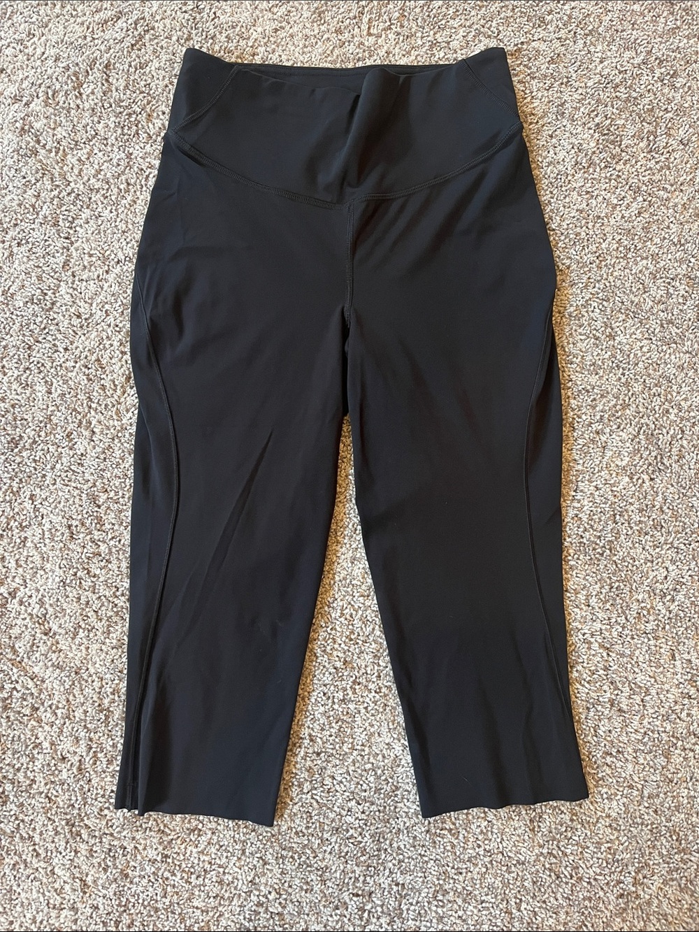 lululemon black cropped performance leggings with reflective logo